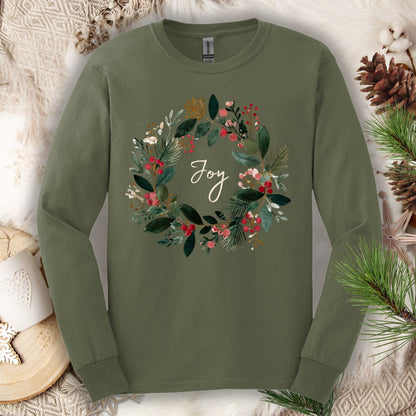 Military Green Gildan long sleeve tee with a watercolor Christmas wreath and "Joy" in the center.