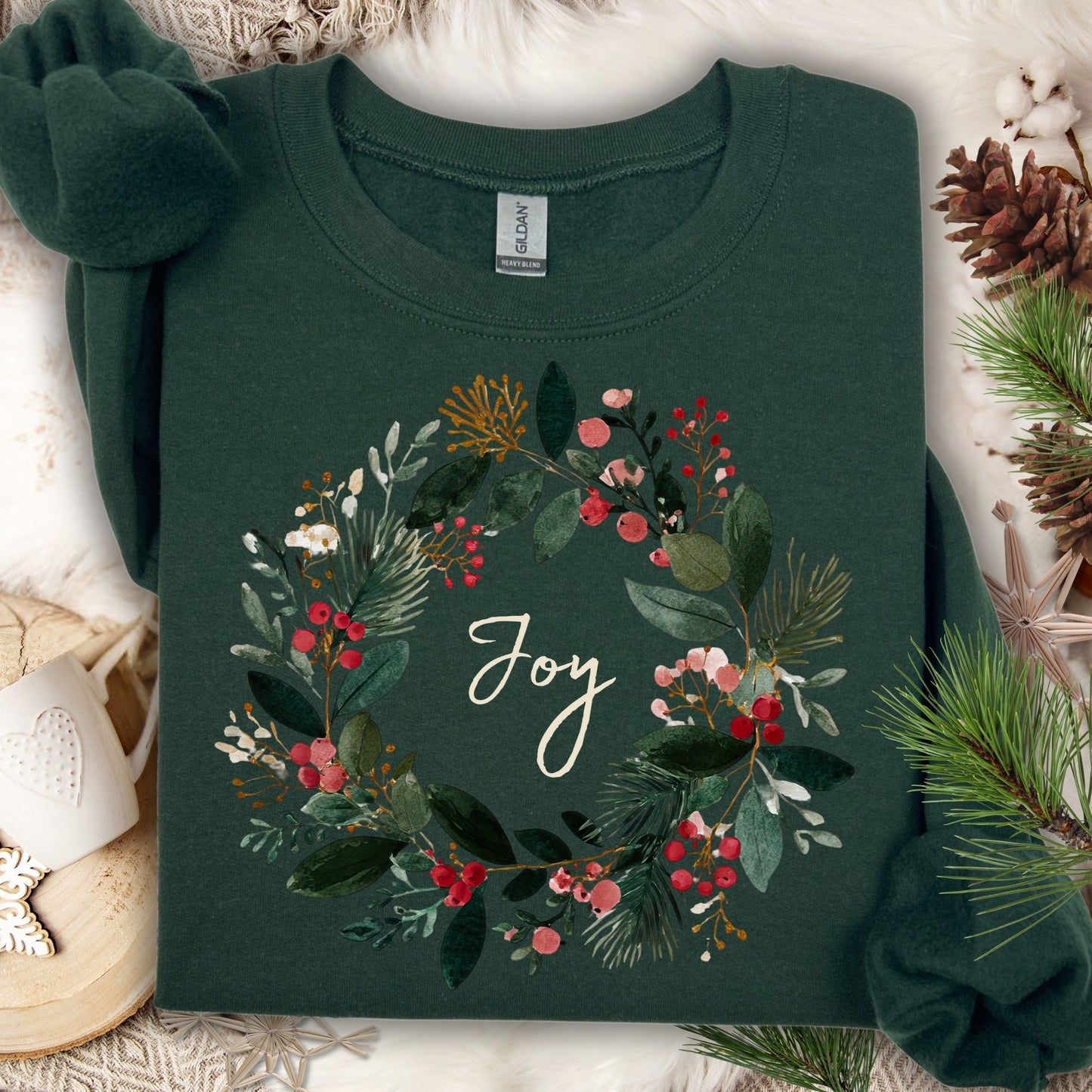 Forest Green crewneck sweatshirt with a watercolor Christmas wreath and "Joy" in the center.