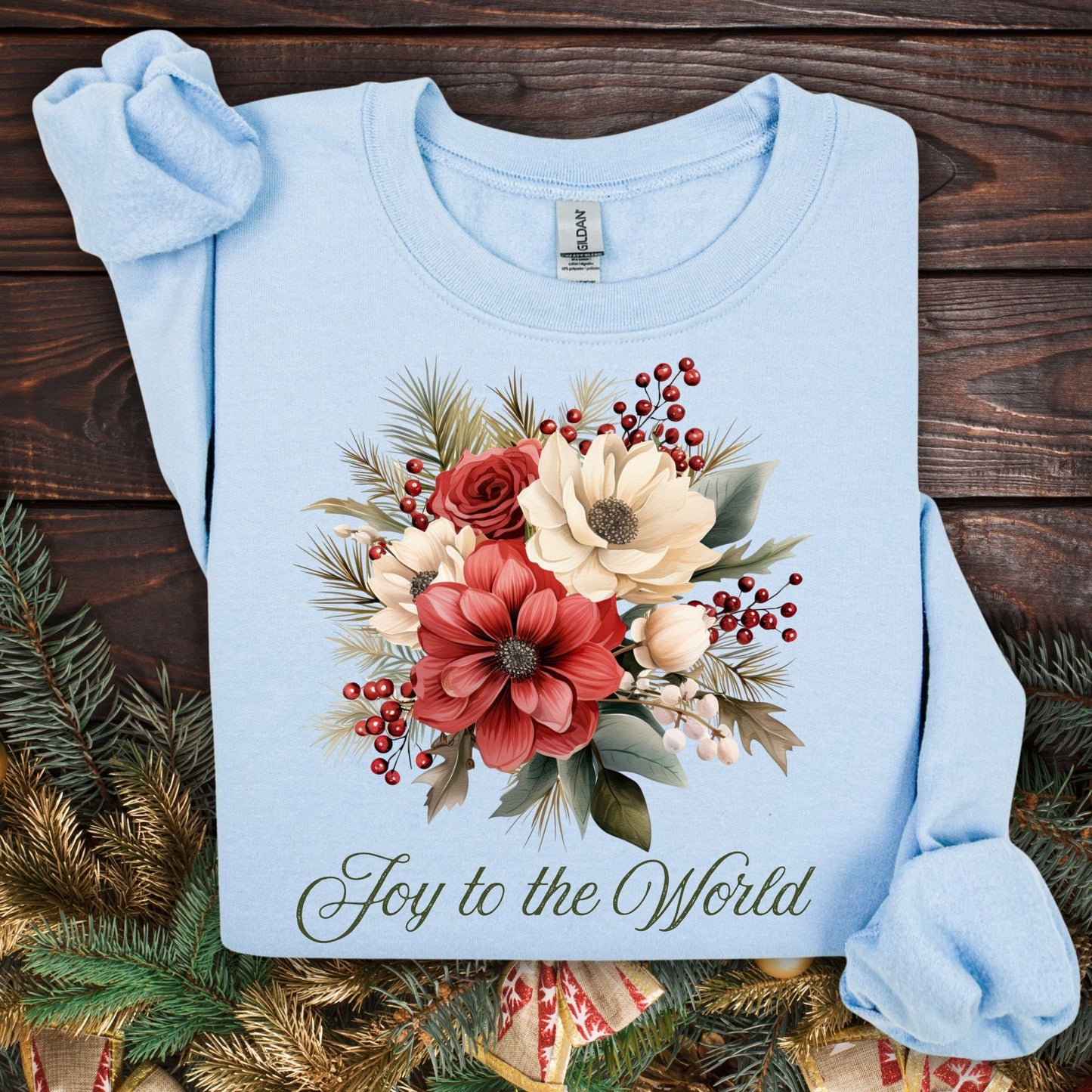 Light blue Gildan sweatshirt with vintage poinsettia, white rose, and "Joy to the World" design.