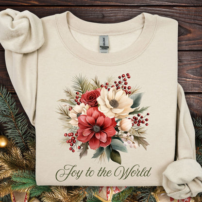 Sand Gildan sweatshirt with vintage poinsettia, rose, and berry bouquet, plus "Joy to the World" text.