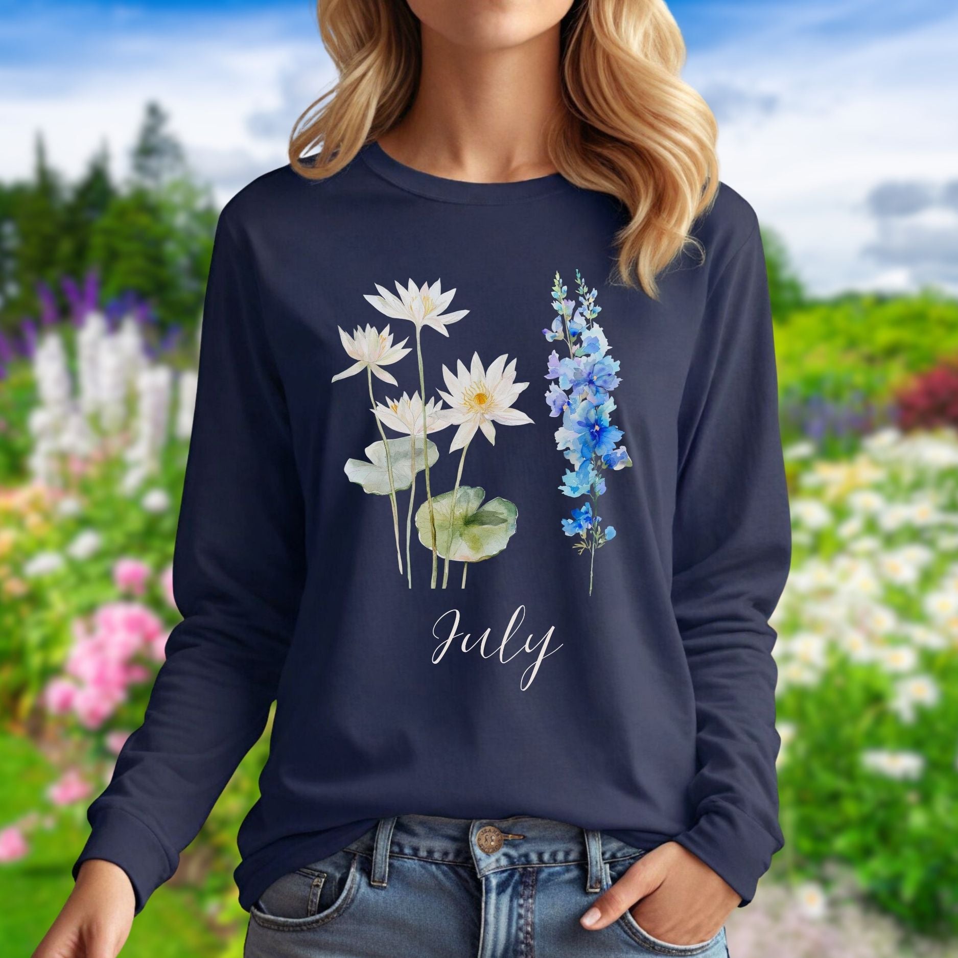 Navy long-sleeve tee with watercolor waterlily and larkspur flowers and "July" text.
