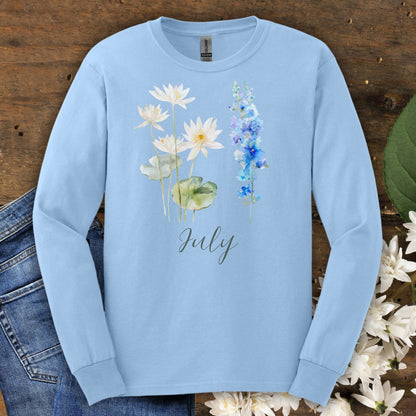 Light blue long-sleeve tee with watercolor waterlilies, larkspur, and "July" text, size S.