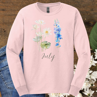 Light pink long sleeve tee with watercolor waterlily and larkspur flowers, "July" script.
