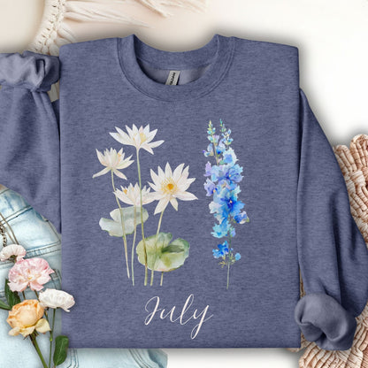 Heather Sport Dark Navy sweatshirt with watercolor waterlilies, larkspur, and "July" text.