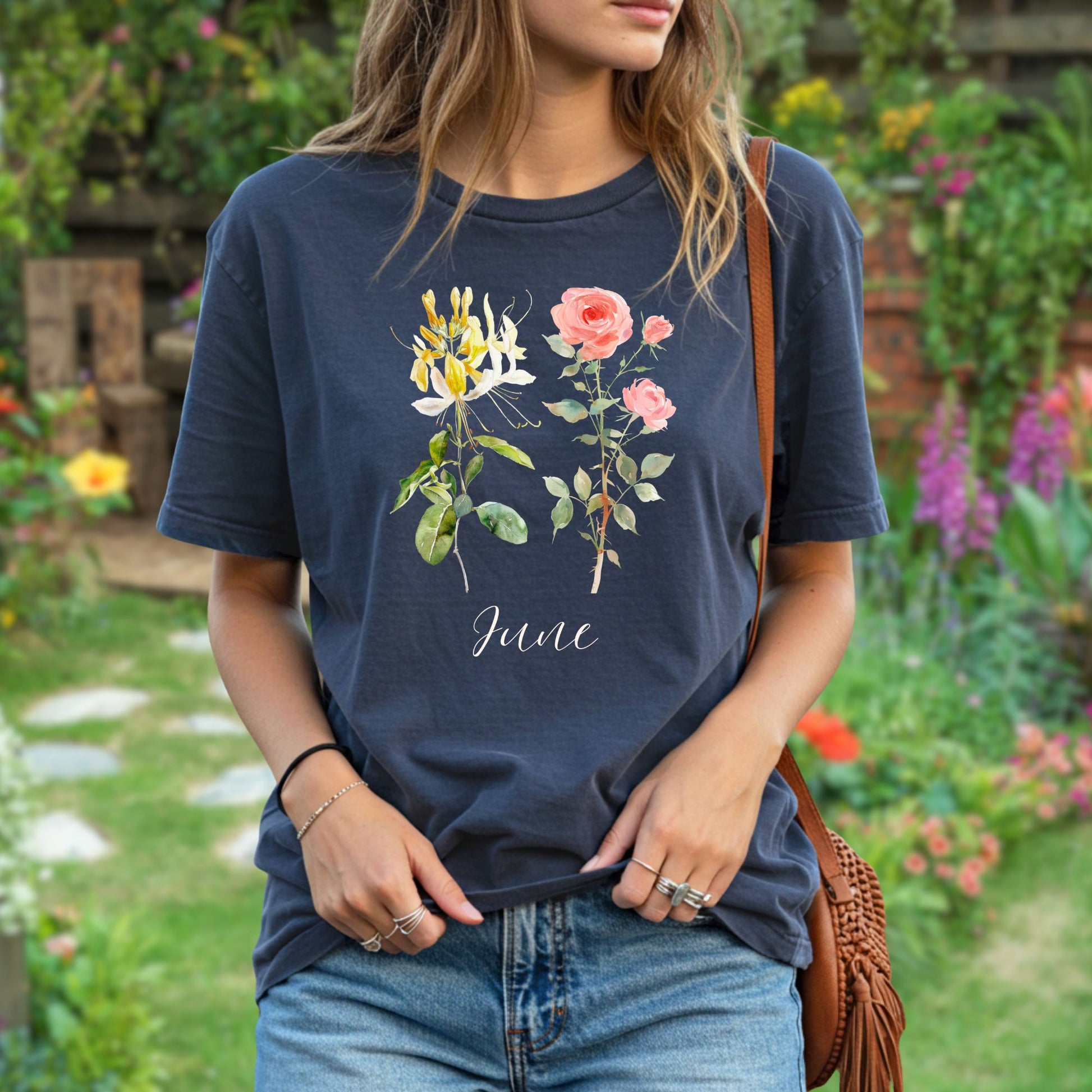 Garment-dyed navy cotton t-shirt with watercolor honeysuckle, rose, and "June" design.