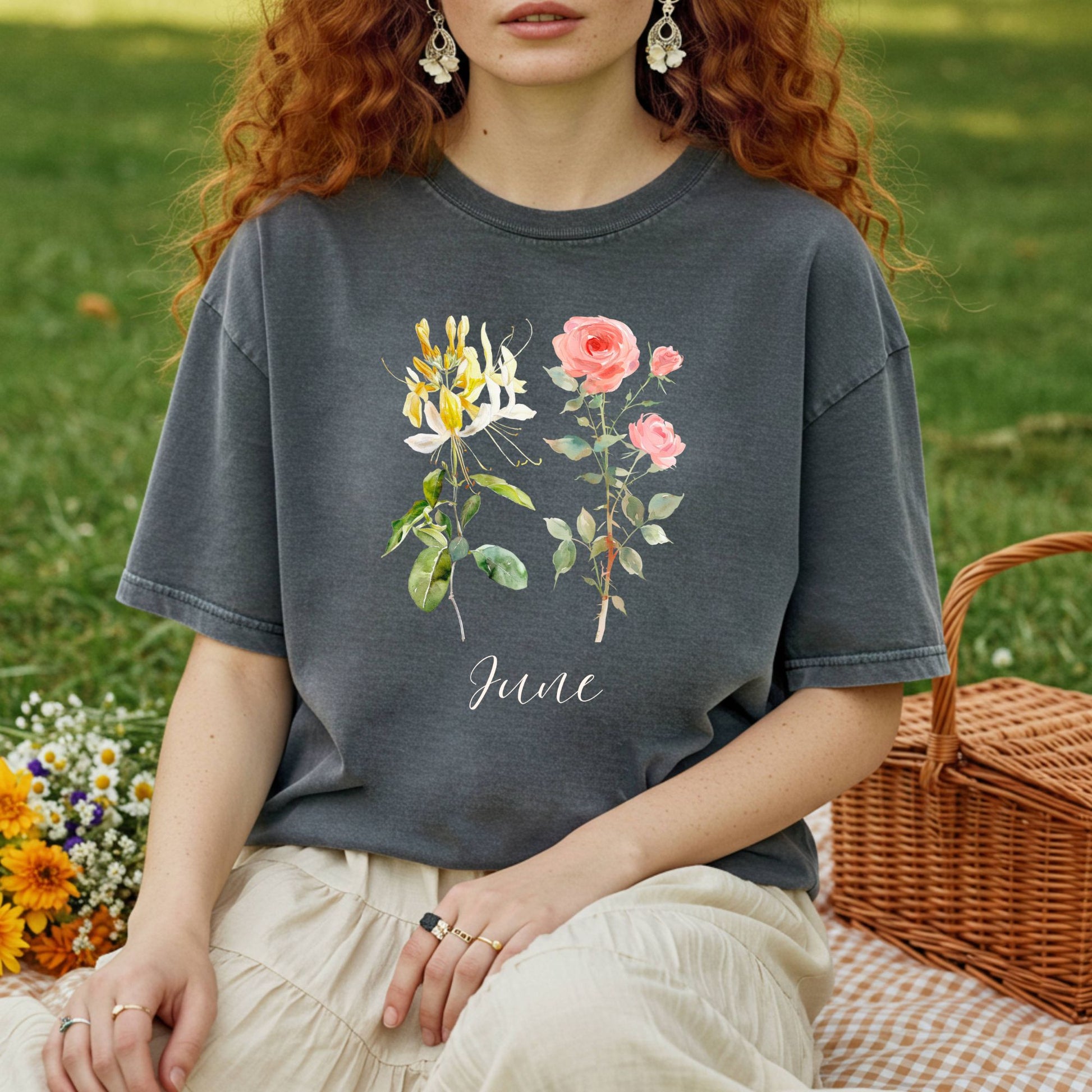 Garment-dyed charcoal cotton t-shirt with watercolor honeysuckle and rose florals, and "June" lettering.