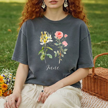 Garment-dyed charcoal cotton t-shirt with watercolor honeysuckle and rose florals, and "June" lettering.