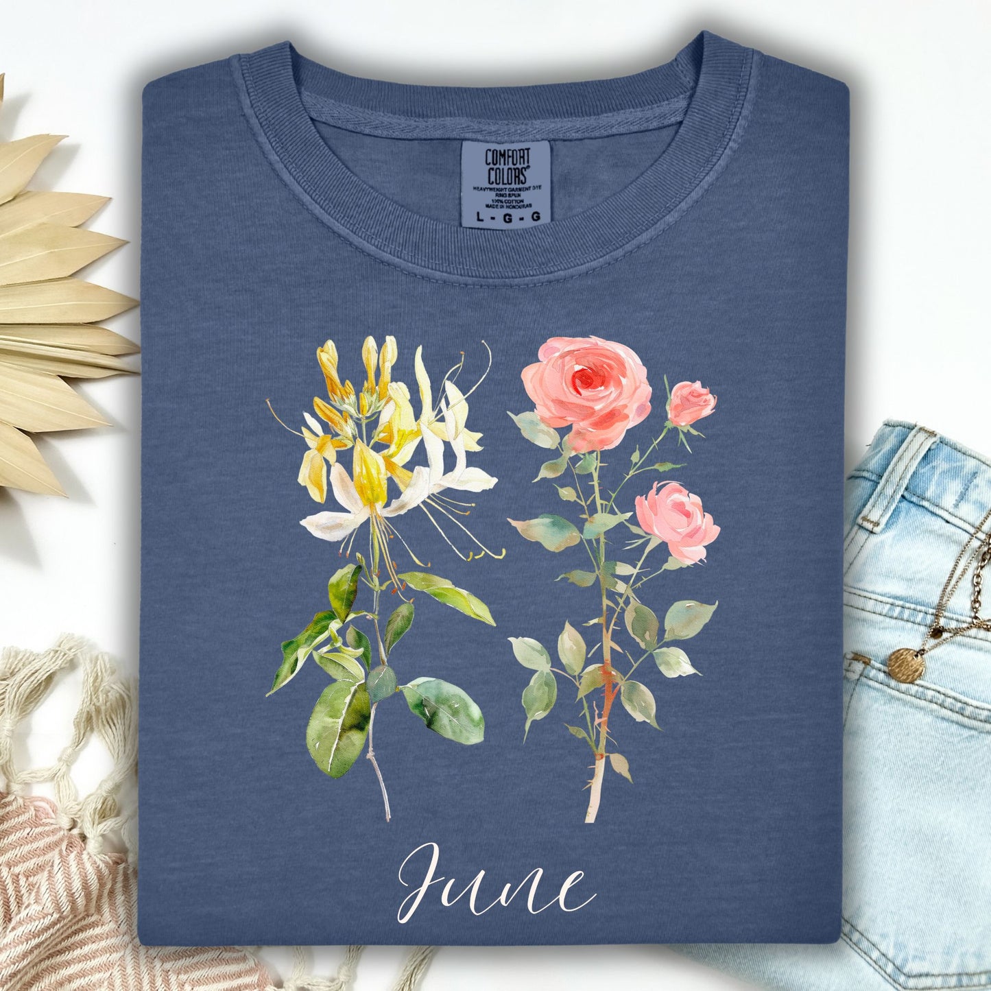Denim blue June birth month flower t-shirt with watercolor honeysuckle and rose design.