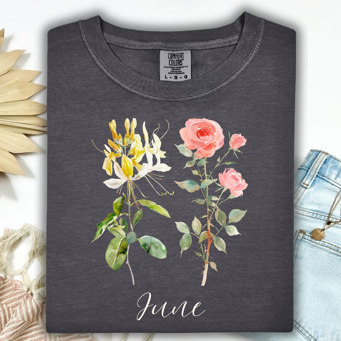 Pepper S garment-dyed cotton t-shirt with watercolor honeysuckle, rose, and "June" lettering.