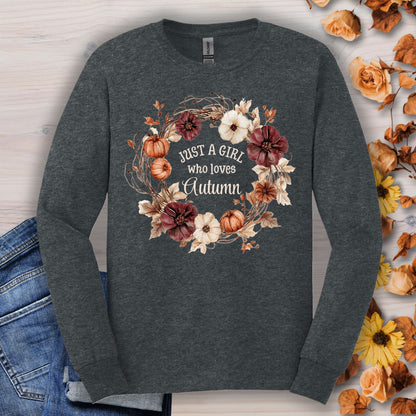 Dark Heather long sleeve tee with "Just a Girl who loves Autumn" in a watercolor wreath of pumpkins and flowers.