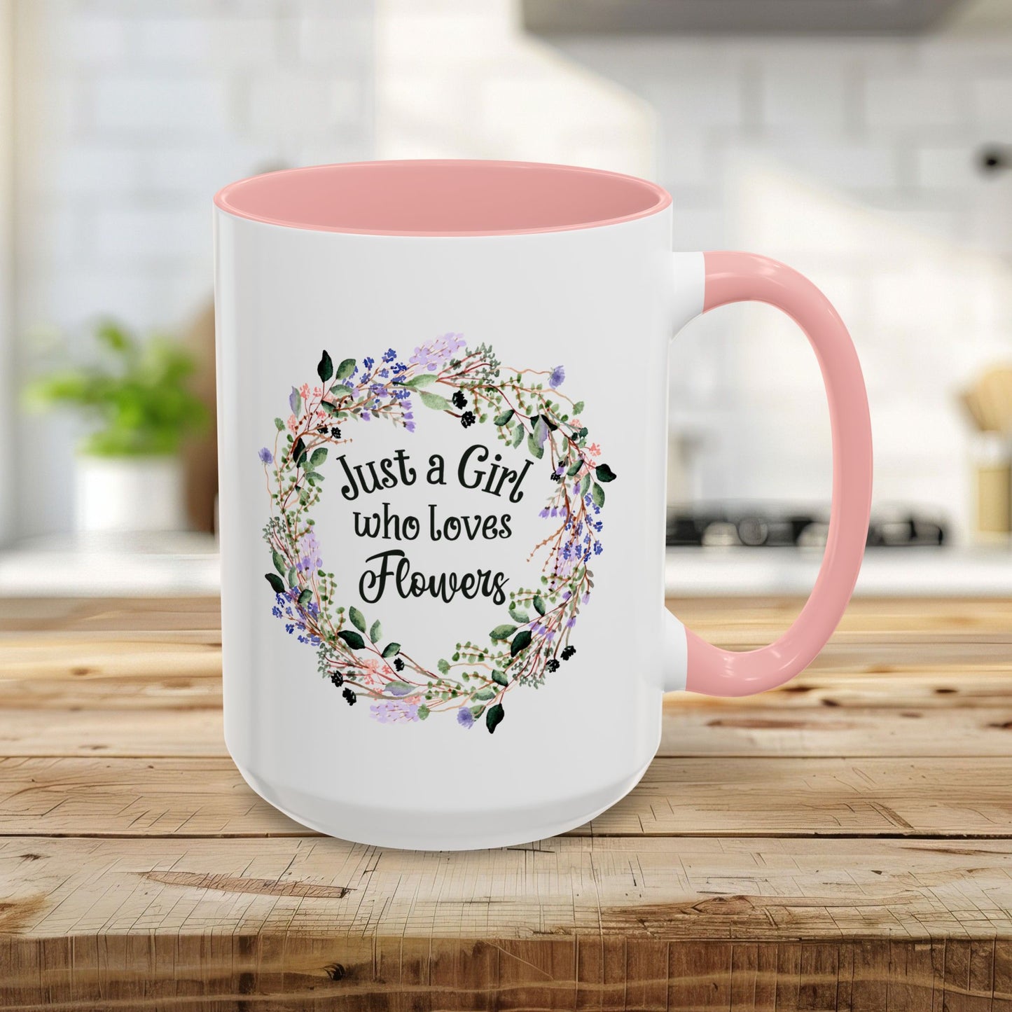 15oz white mug with pink interior/handle, "Just a Girl who Loves Flowers" in a watercolor floral wreath.