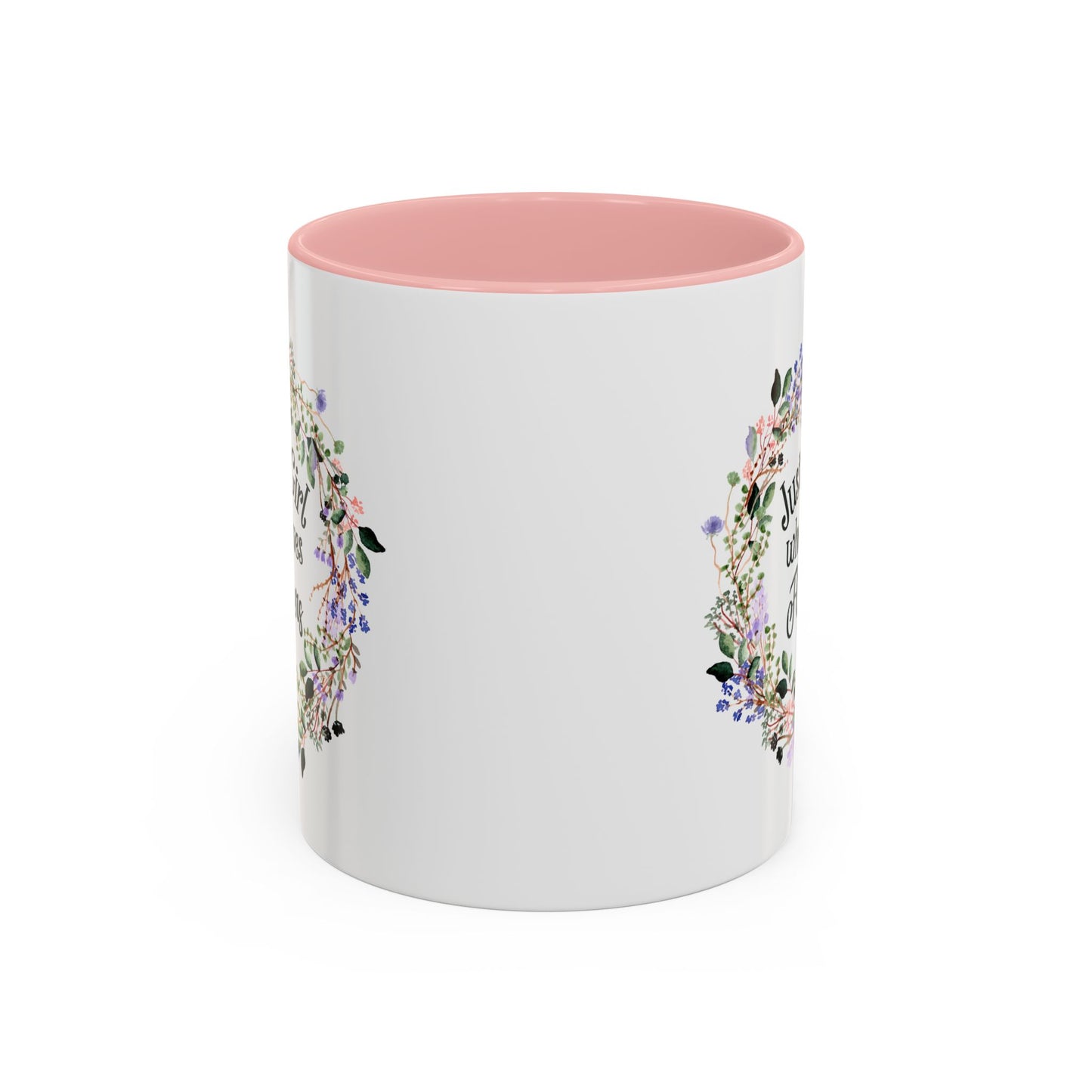 White ceramic mug with pink interior and handle, featuring a watercolor floral wreath and "Just a Girl who Loves Flowers" text.
