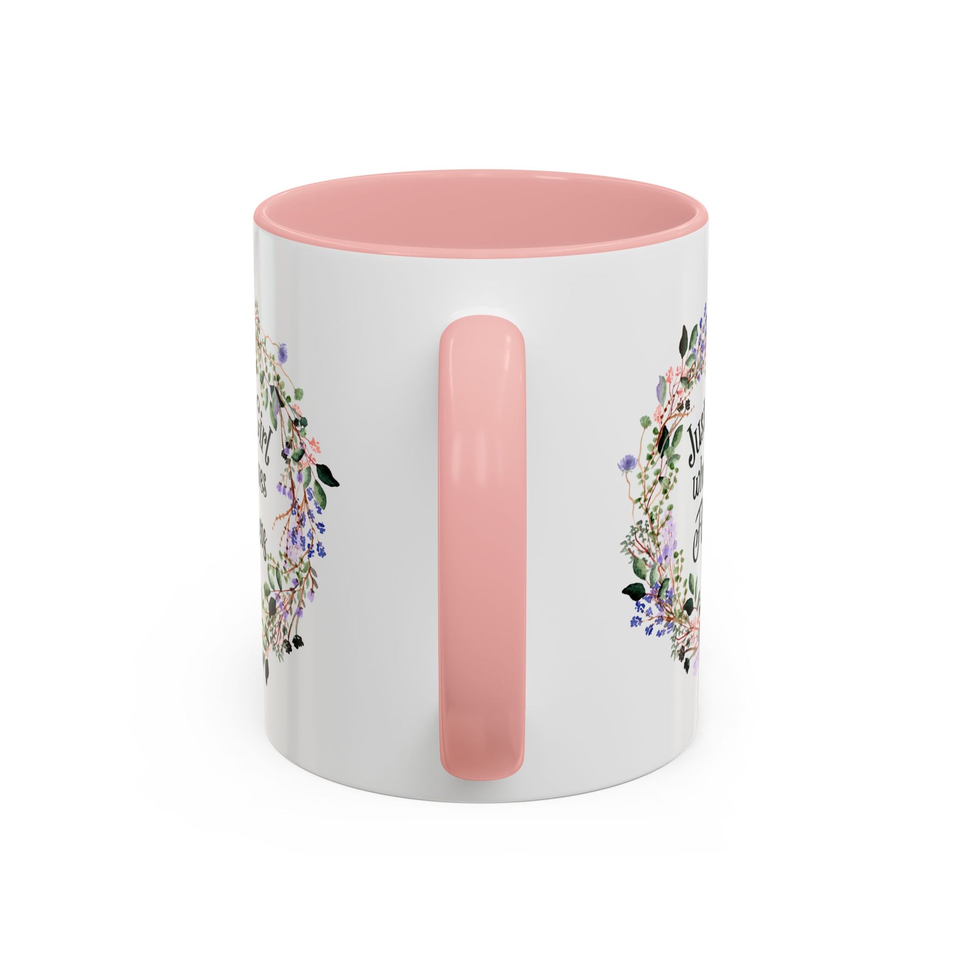 White ceramic mug with pink interior and handle, featuring a watercolor floral wreath design.