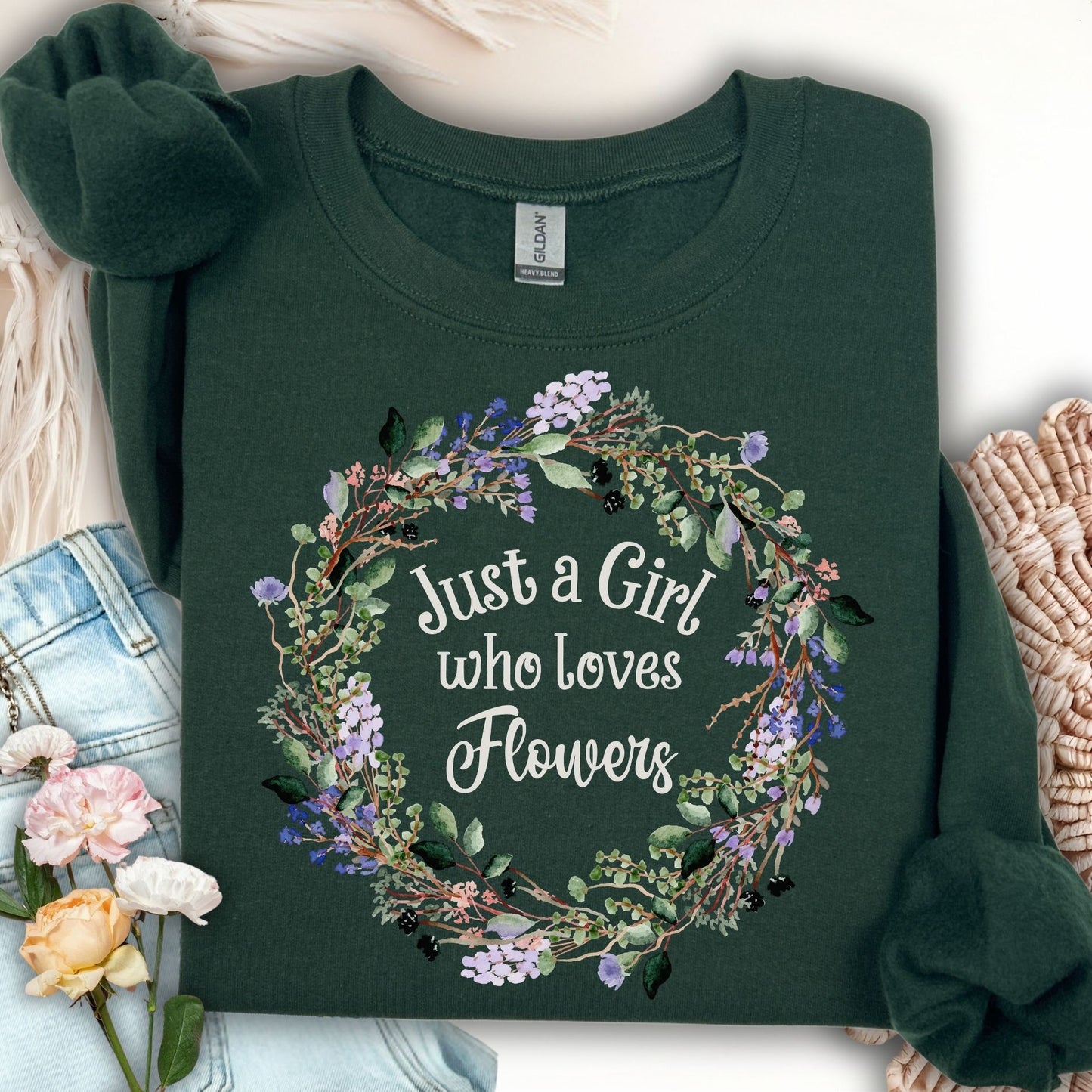 Forest Green unisex sweatshirt with "Just a Girl who loves Flowers" in a delicate floral wreath.