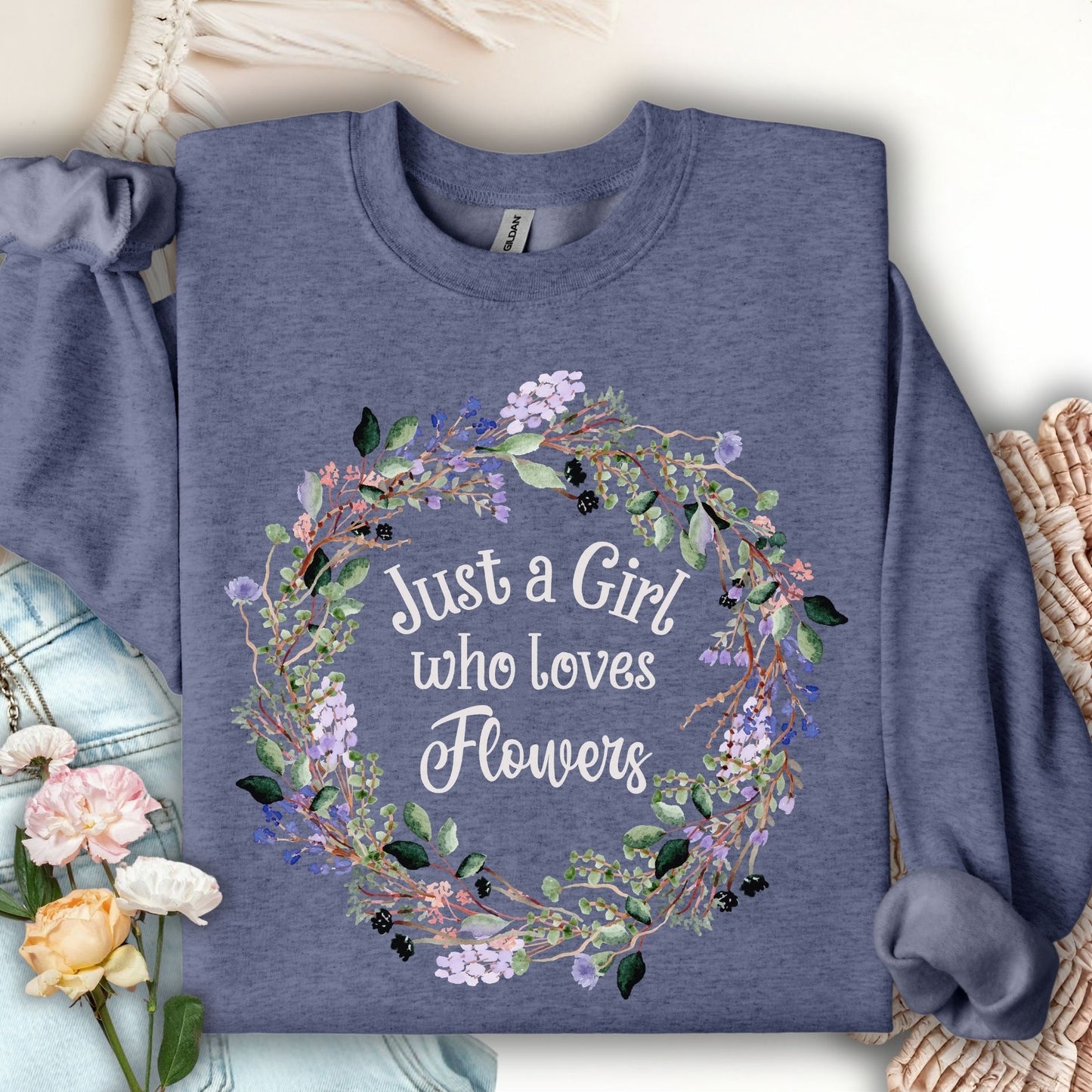 Heather Sport Dark Navy sweatshirt with "Just a Girl who loves Flowers" in a floral wreath design.
