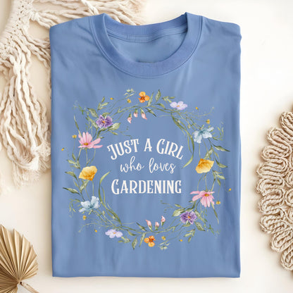 Carolina Blue S t-shirt with "Just a Girl who loves Gardening" in a colorful wildflower wreath.