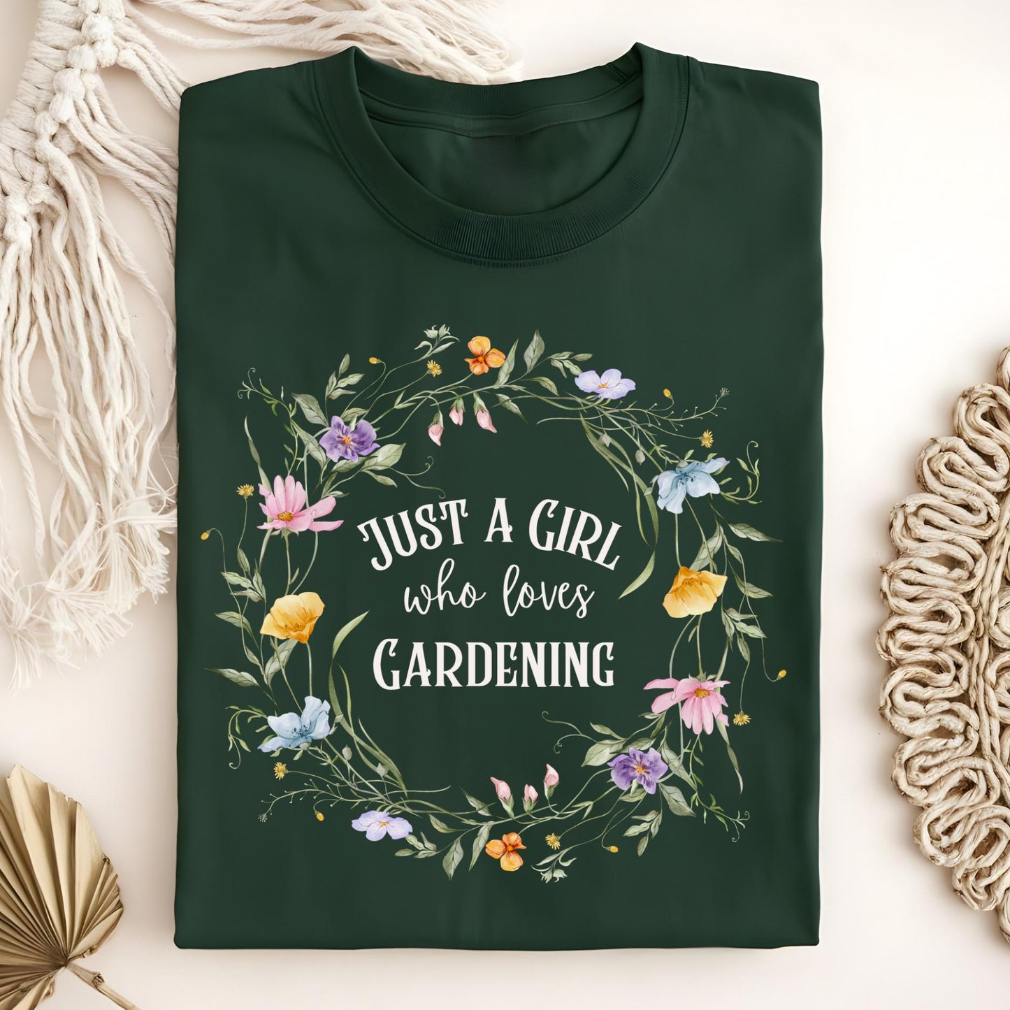 Forest Green "Just a Girl Who Loves Gardening" t-shirt with a colorful wildflower wreath design.