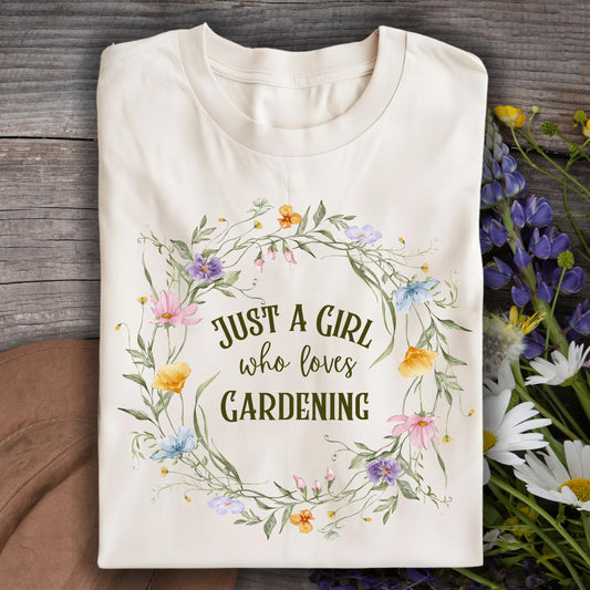 Natural S-size t-shirt with "Just a Girl who loves GARDENING" in a wildflower wreath design.