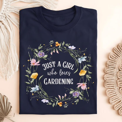 Navy "Just a Girl Who Loves Gardening" t-shirt with a colorful wildflower wreath design.