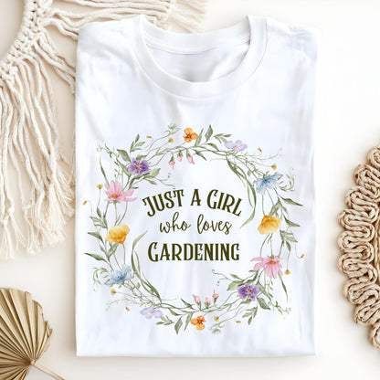 White "Just a Girl who loves GARDENING" t-shirt with a colorful wildflower wreath design.