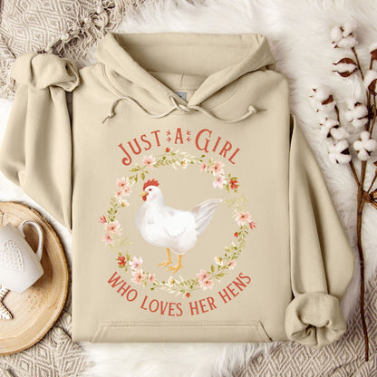 Sand Gildan 18500 hoodie with "Just a Girl Who Loves Her Hens" text and watercolor chicken in a floral wreath.