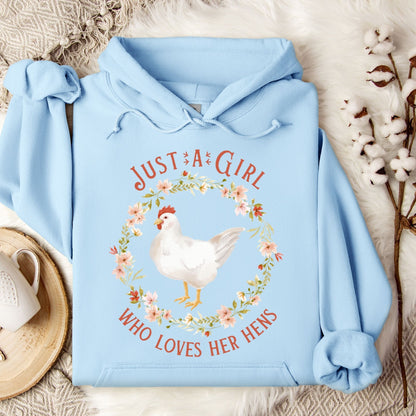 Light blue Gildan 18500 hoodie with "Just a Girl Who Loves Her Hens" text and watercolor chicken art.