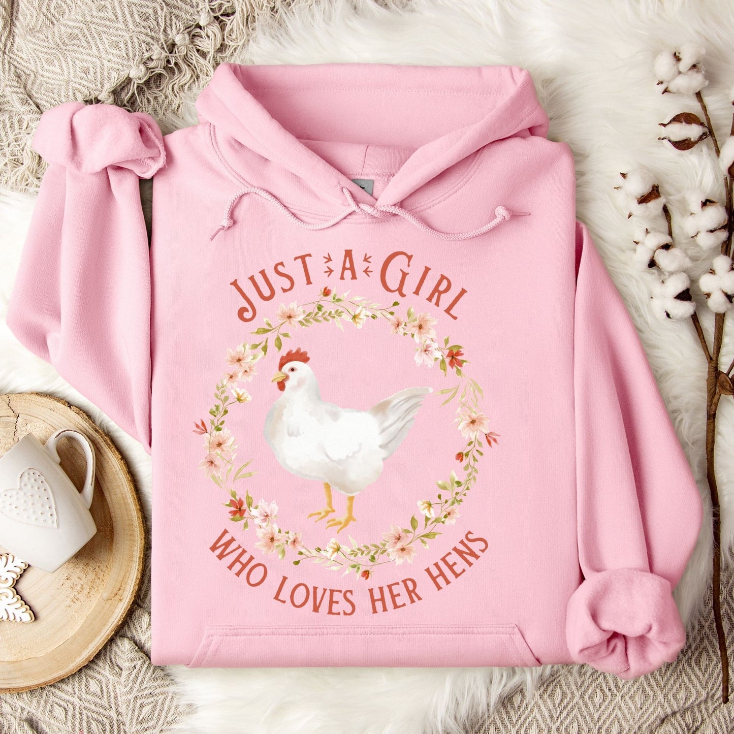 Light pink Gildan 18500 hoodie with "Just a Girl Who Loves Her Hens" text and watercolor chicken art.