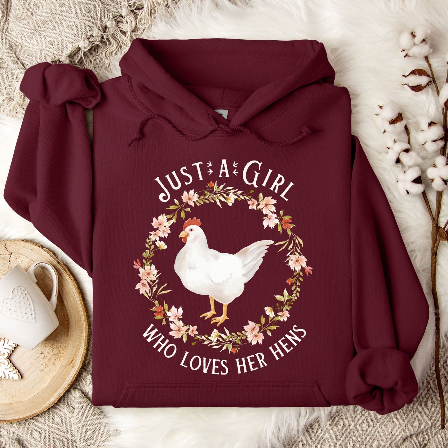 Maroon Gildan 18500 hoodie with "Just a Girl Who Loves Her Hens" text and watercolor chicken art.