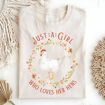 Natural S heavyweight cotton t-shirt with "Just a Girl Who Loves Her Hens" text and a chicken in a floral wreath.
