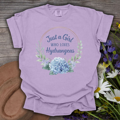 Orchid garment-dyed cotton t-shirt with "Just a Girl Who Loves Hydrangeas" in a watercolor floral wreath.