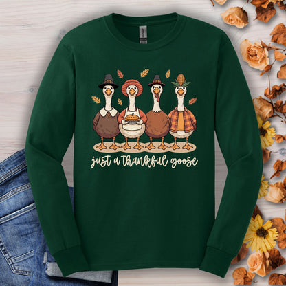 Forest Green long sleeve tee with pilgrim ducks, pumpkin pie, and "just a thankful goose" text.