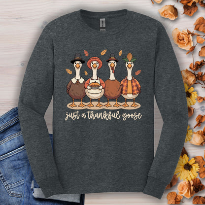 Dark Heather long sleeve tee with pilgrim ducks, pumpkin pie, and "just a thankful goose" text.
