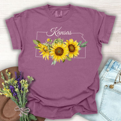Berry S T-shirt with Kansas state outline and golden sunflowers.