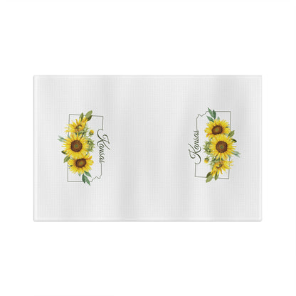 White microfiber tea towel with vibrant Kansas sunflower design and state name.