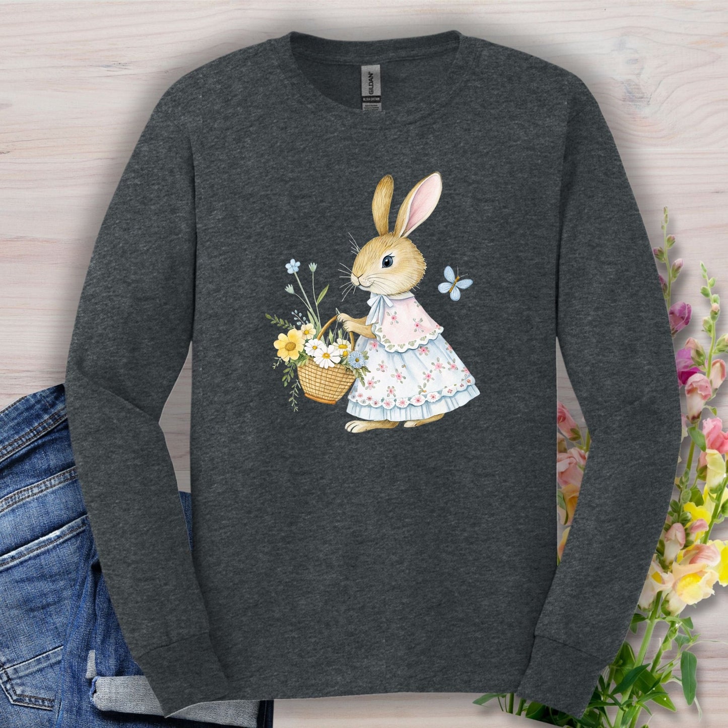Dark Heather long sleeve tee with a watercolor lady bunny in a floral dress holding a spring flower basket.