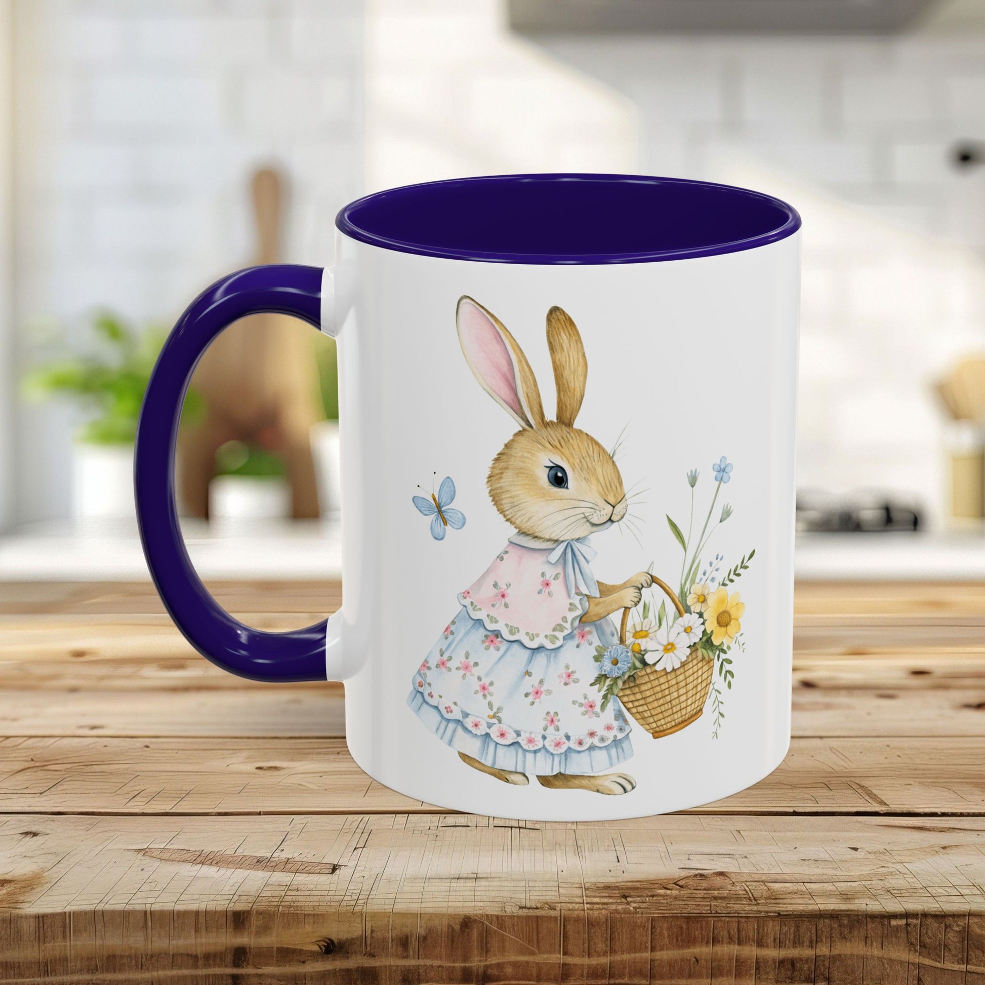 White ceramic mug with a purple handle and interior, featuring a watercolor bunny in a dress holding a flower basket.