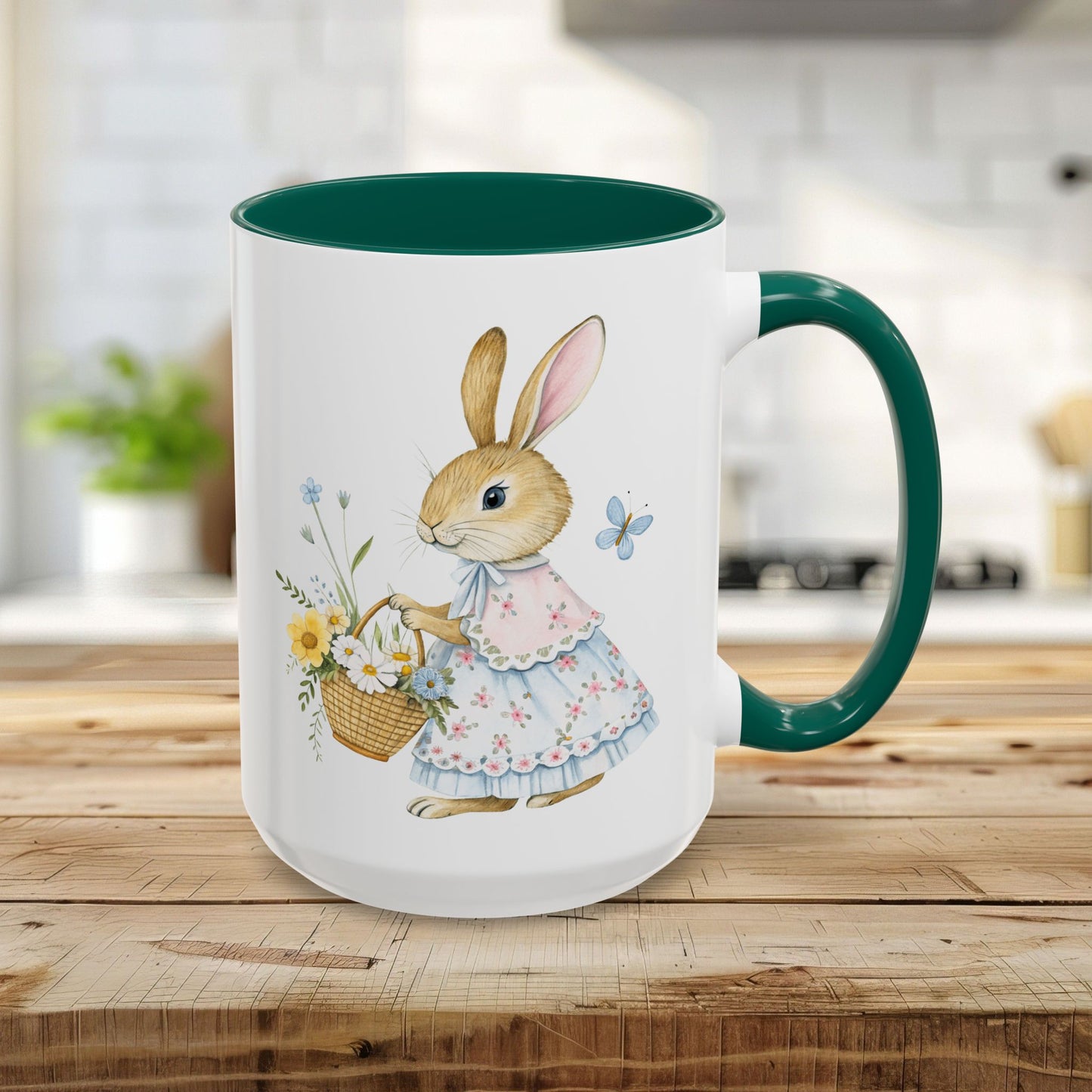 15oz white ceramic mug with a green interior and handle, featuring a watercolor bunny in a floral dress holding a flower basket.