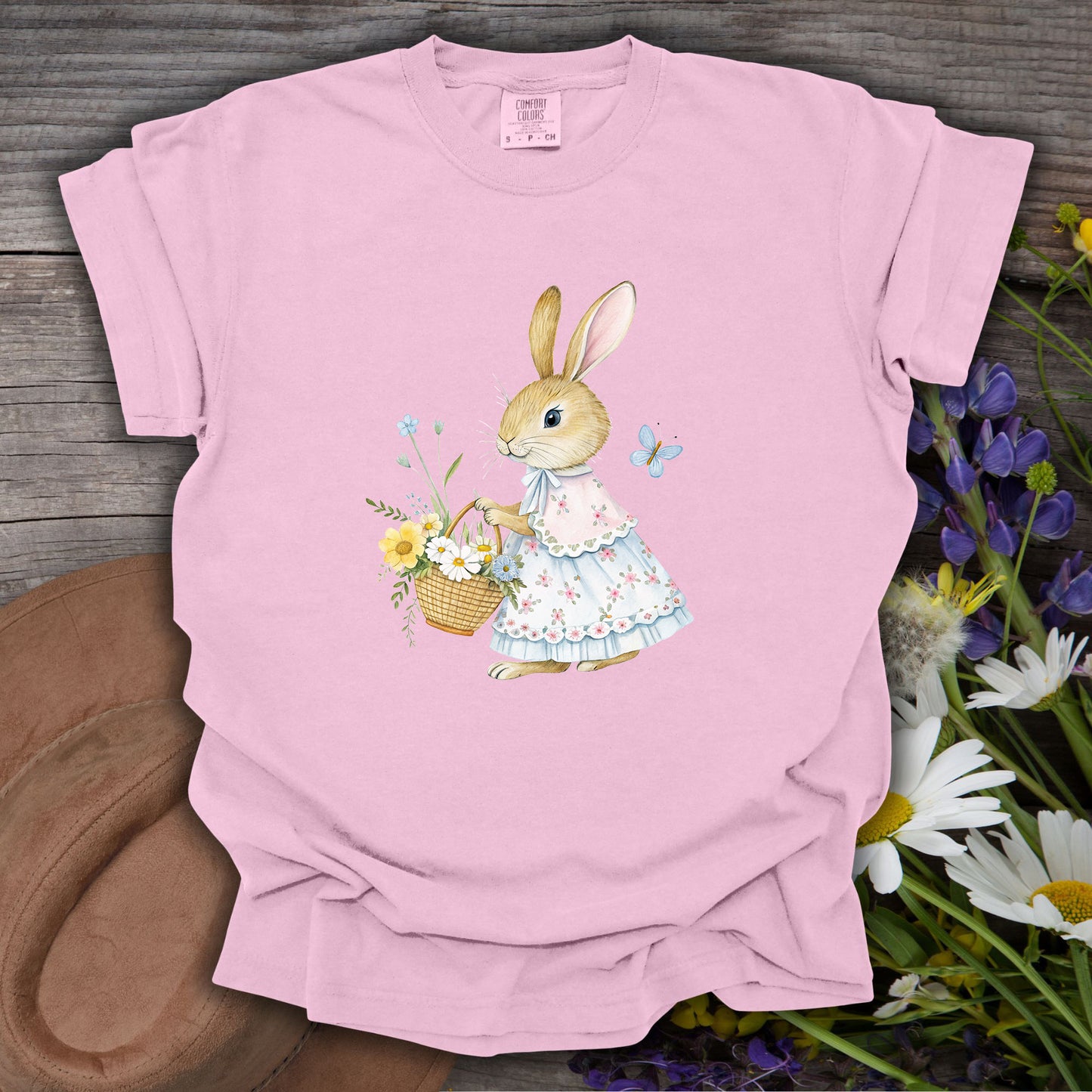 Blossom pink S-size t-shirt with a watercolor bunny in a floral dress holding a spring flower basket.