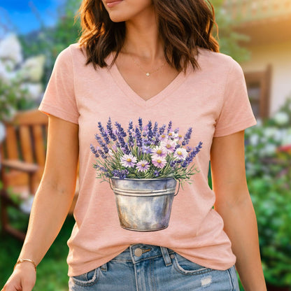 Peach v-neck tee with a rustic metal pot print filled with lavender and white daisies.