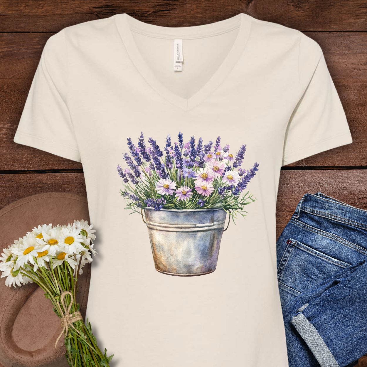 Heather Dust S v-neck tee with a faded botanical print of lavender and daisies in a rustic metal pot.