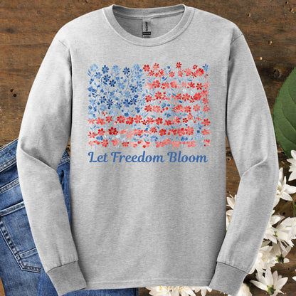 Ash S long sleeve tee with a faded floral American flag and "Let Freedom Bloom" graphic.