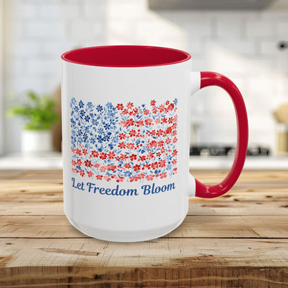 15oz white ceramic mug with red interior/handle, featuring a floral flag design and "Let Freedom Bloom.