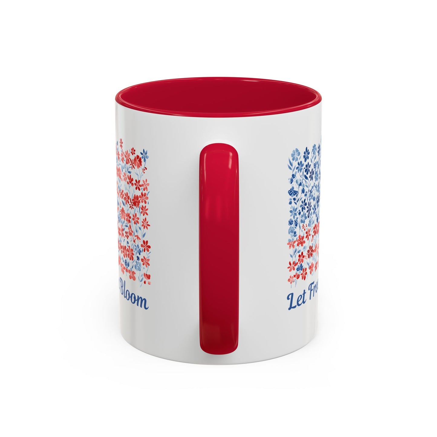 White ceramic mug with red interior and handle, featuring a floral flag design and "Let Freedom Bloom" text.