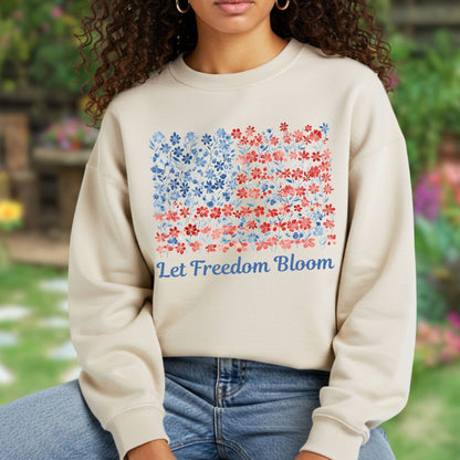 Beige crewneck sweatshirt with a floral flag design and "Let Freedom Bloom" text.
