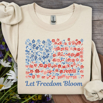 Sand unisex sweatshirt with a floral flag design and "Let Freedom Bloom" text.