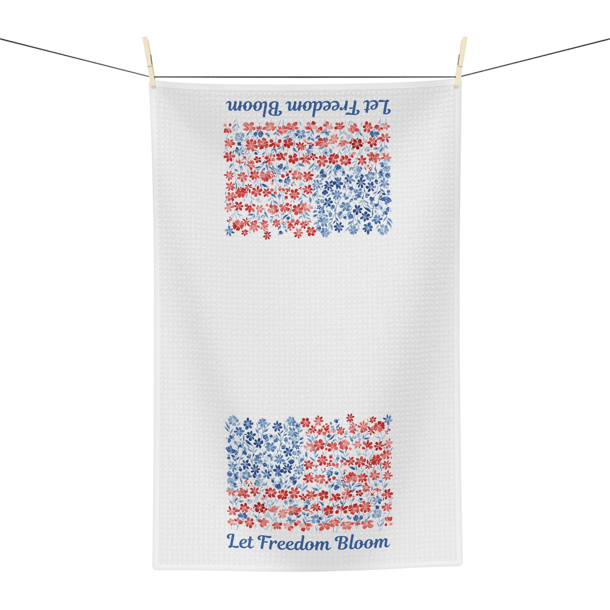 White microfiber tea towel with two floral flag designs and "Let Freedom Bloom" script.