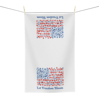 White microfiber tea towel with two floral flag designs and "Let Freedom Bloom" script.