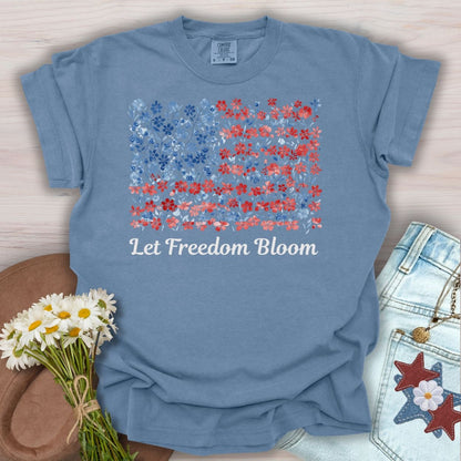 Blue Jean garment-dyed t-shirt with a floral USA flag and "Let Freedom Bloom" text.