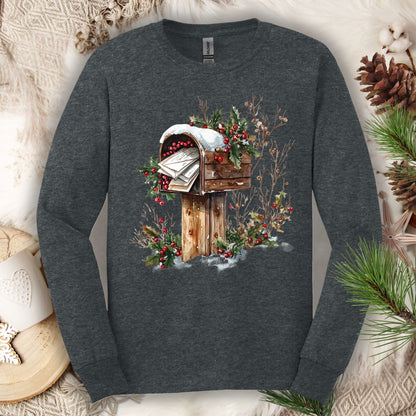 Dark Heather long sleeve tee with a watercolor rustic mailbox, snow, and holly berries, full of letters to Santa.