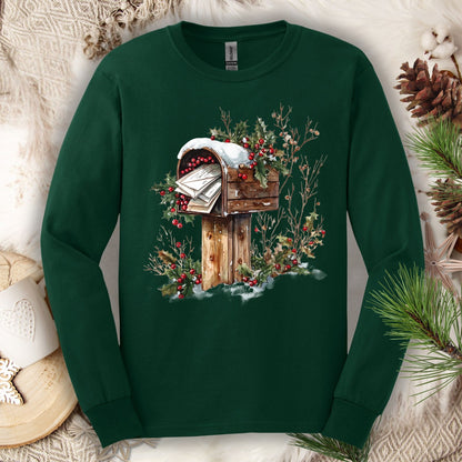 Forest Green long sleeve tee with a watercolor rustic mailbox overflowing with Santa letters, snow, and holly.